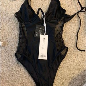 White fox brand new swimsuit. Sexy mesh size small